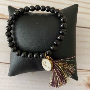 NWOT 💫BLACK STRETCH ELASTIC BRACELET WITH TASSEL AND LOVE PENDANT
